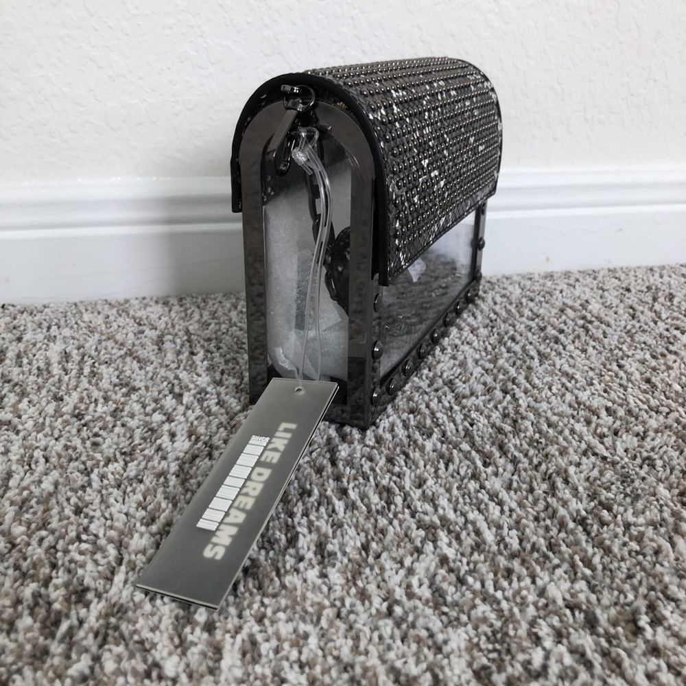 Ladies mixed with Acrylic Glass Clutch with black chain outer handle.
